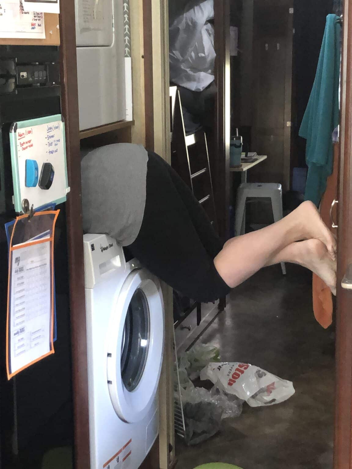Washing-machine-repair-checking-for-leaks-min-1152x1536.jpg
