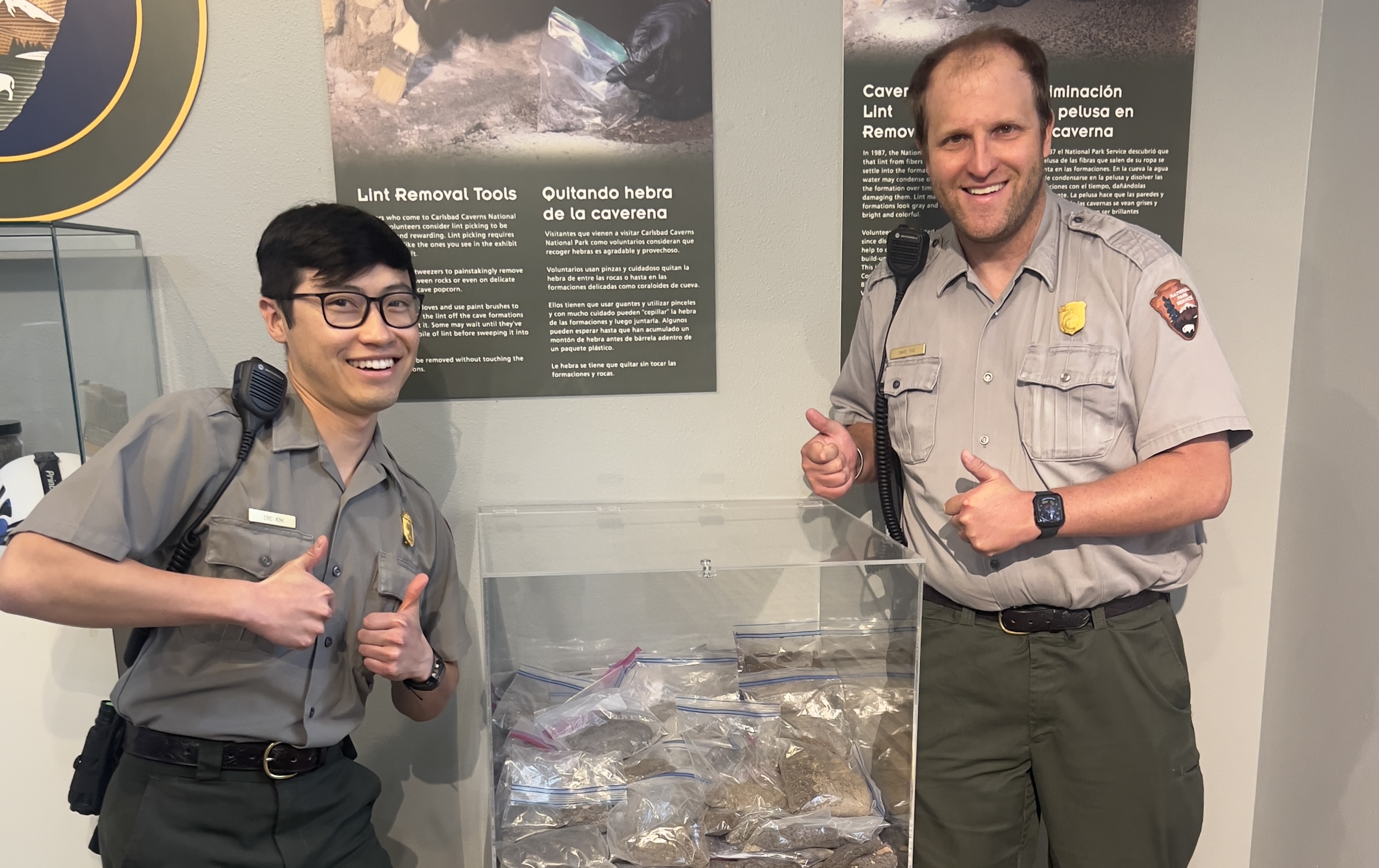 Park Rangers showcasing lint collection
